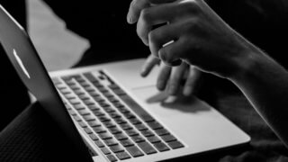 typing on laptop