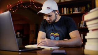 Thomas studying at desk