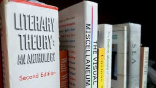 Close up of textbooks on a shelf