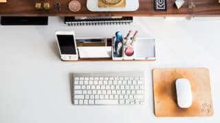 Organized desk with keyboard and mouse