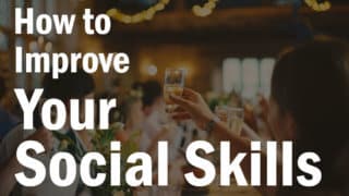 people raising wine glasses for a toast