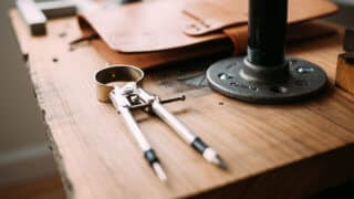 drafting compass on workbench
