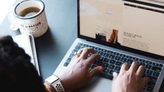 Woman editing website on MacBook