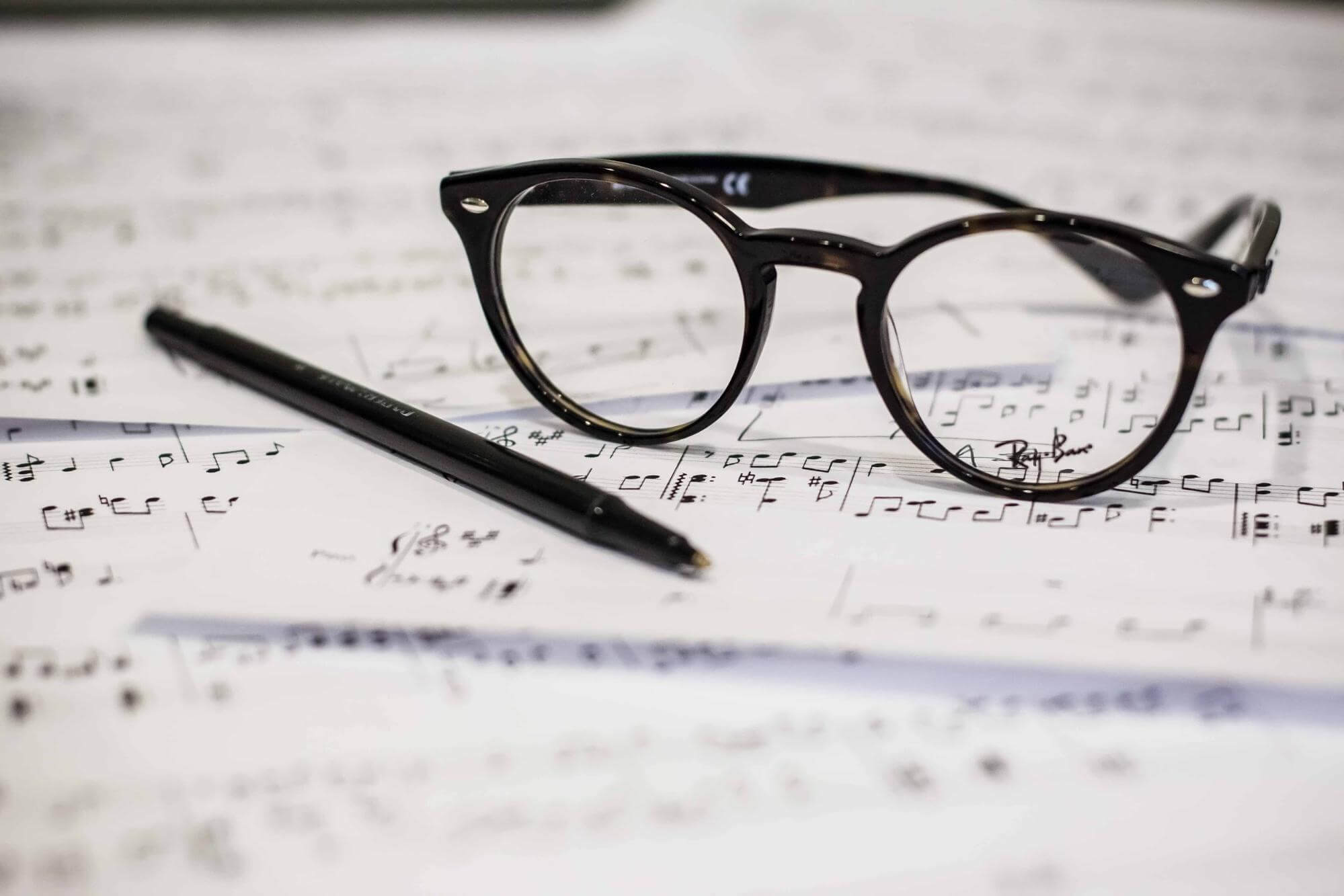 glasses and sheet music