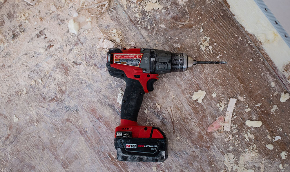 power drill on floor