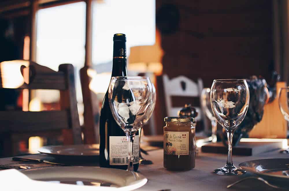 table with wine bottle and glasses