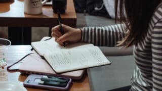 Girl studying in coffee shop