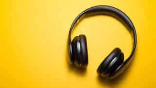 Headphones on yellow background