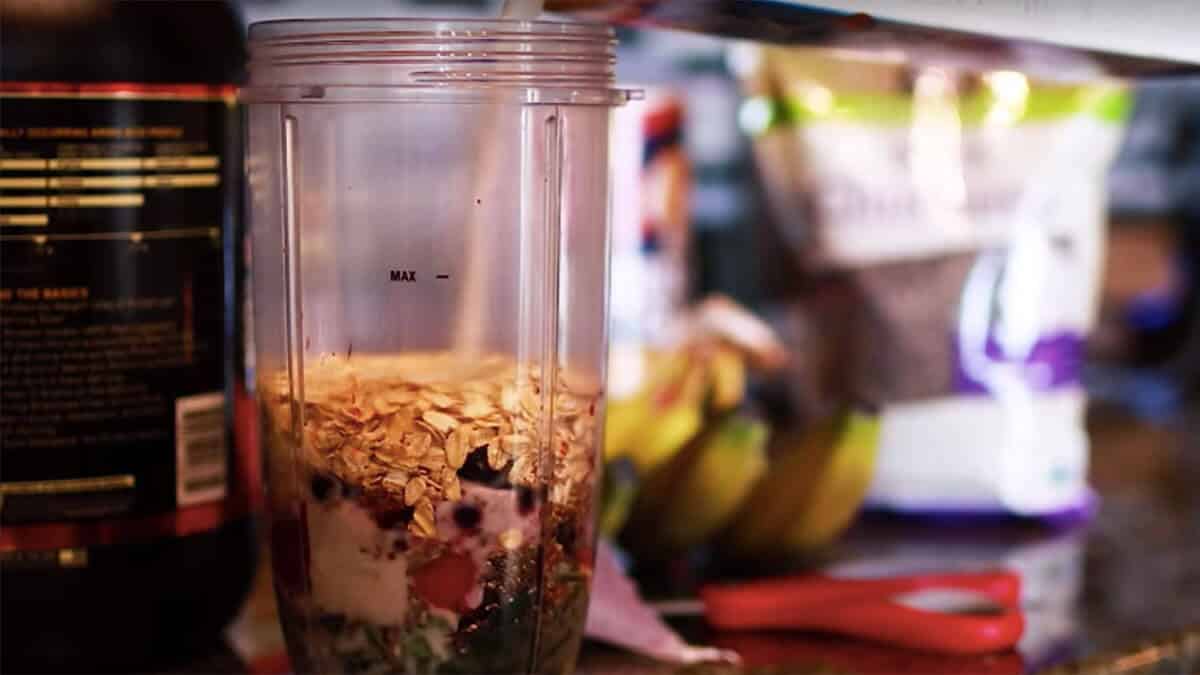 Smoothie ingredients in blender cup