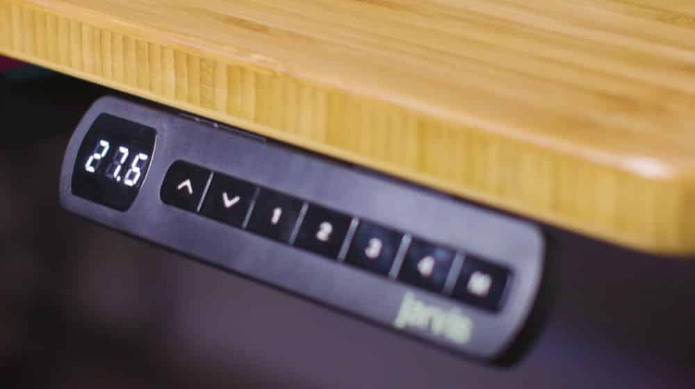 Close up of Jarvis standing desk programmable height adjustment controls