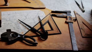 measuring tools and map spread out on table